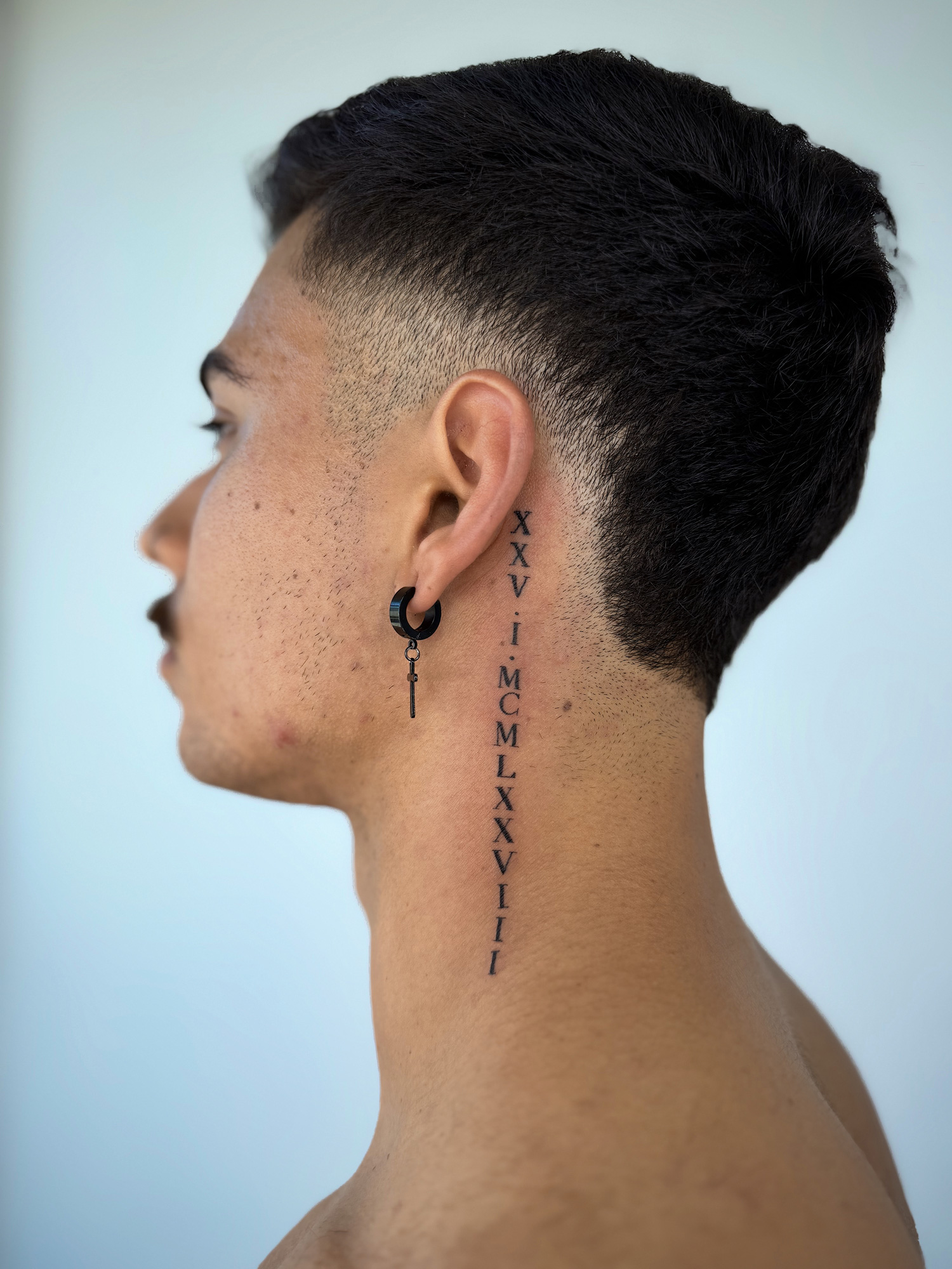 Roman numerals down the neck